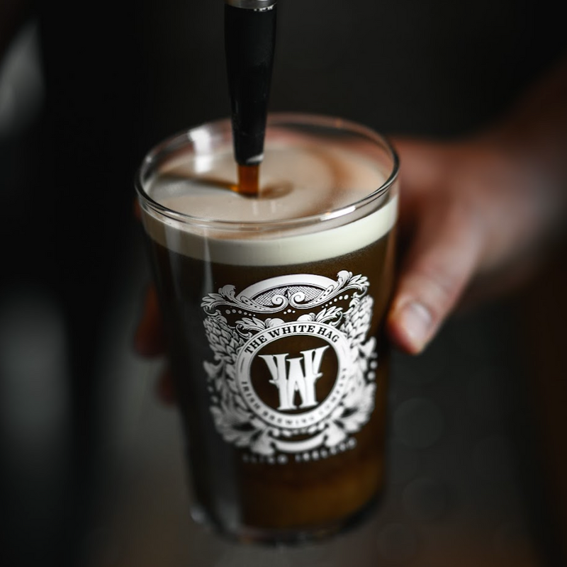 Pint of Darkness Irish Stout being poured